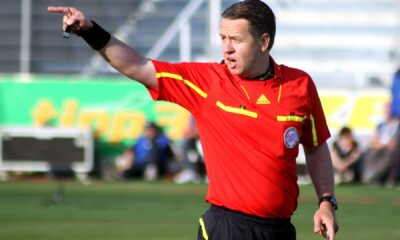 refereeing in action